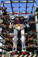 a giant robot standing in front of a building