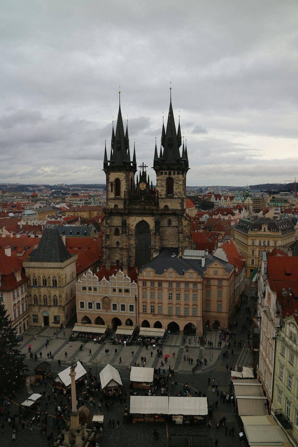 an aerial view of a city with a clock tower