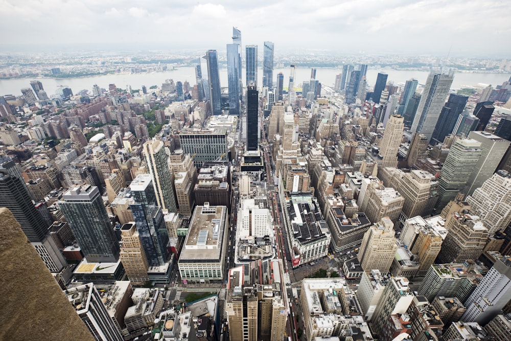 an aerial view of a city with tall buildings