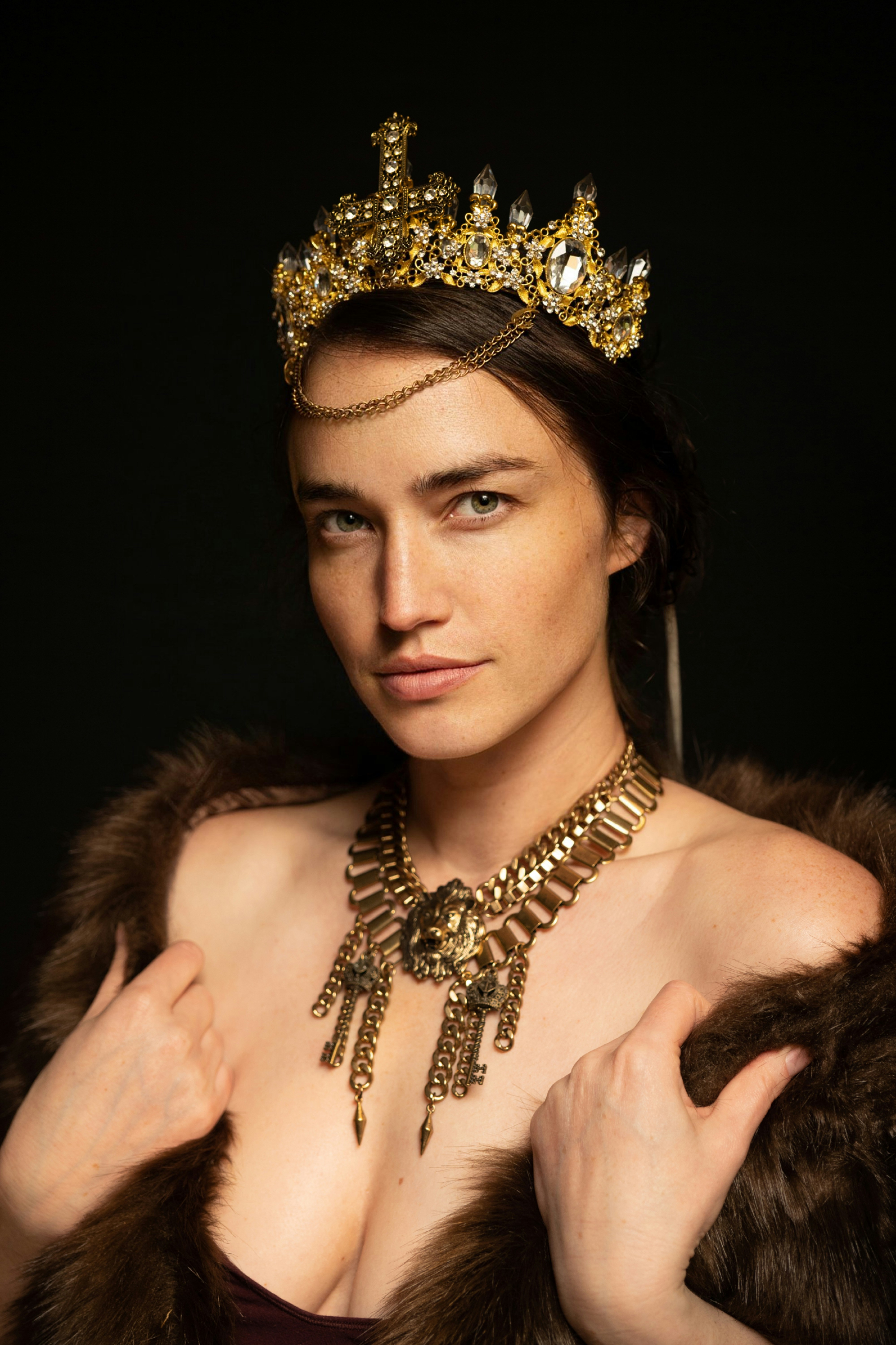 Portland Fashion Model wearing a gold crown and necklace Portrait taken by Portland Photographer Lance Reis on my Sonya7iii in my photography studio.