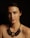 a woman with a necklace on her neck