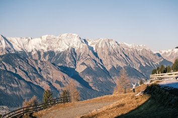 a view of a mountain range with snow on the mountains