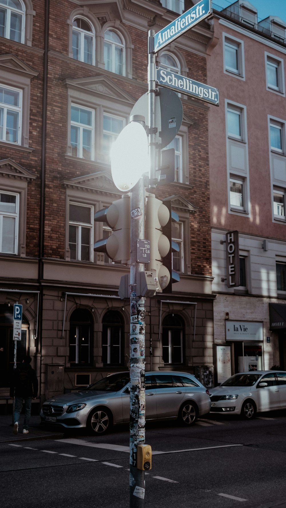 a traffic light sitting on the side of a road