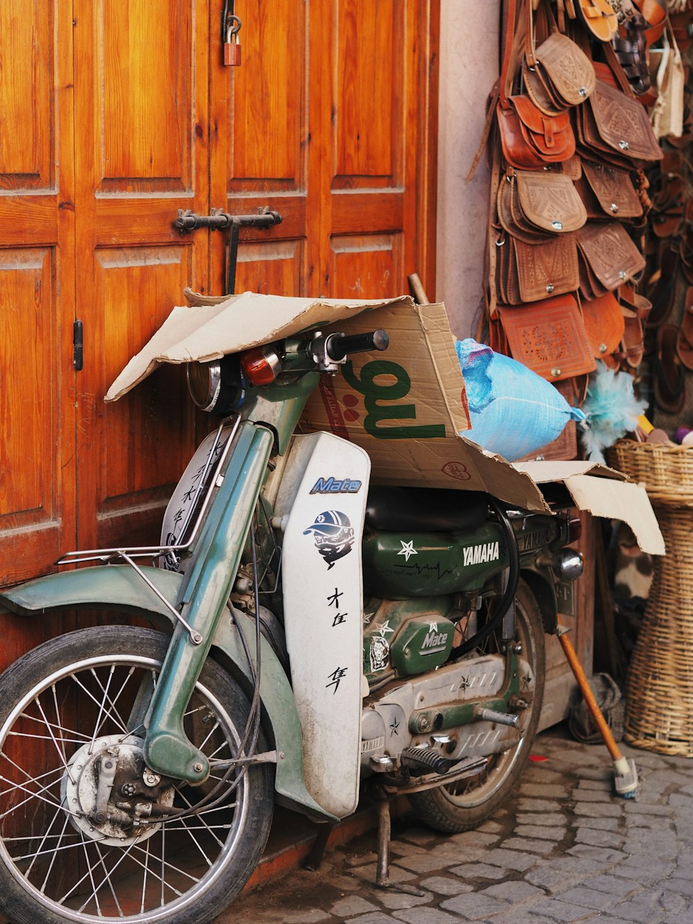 a motorcycle with a box on the back of it