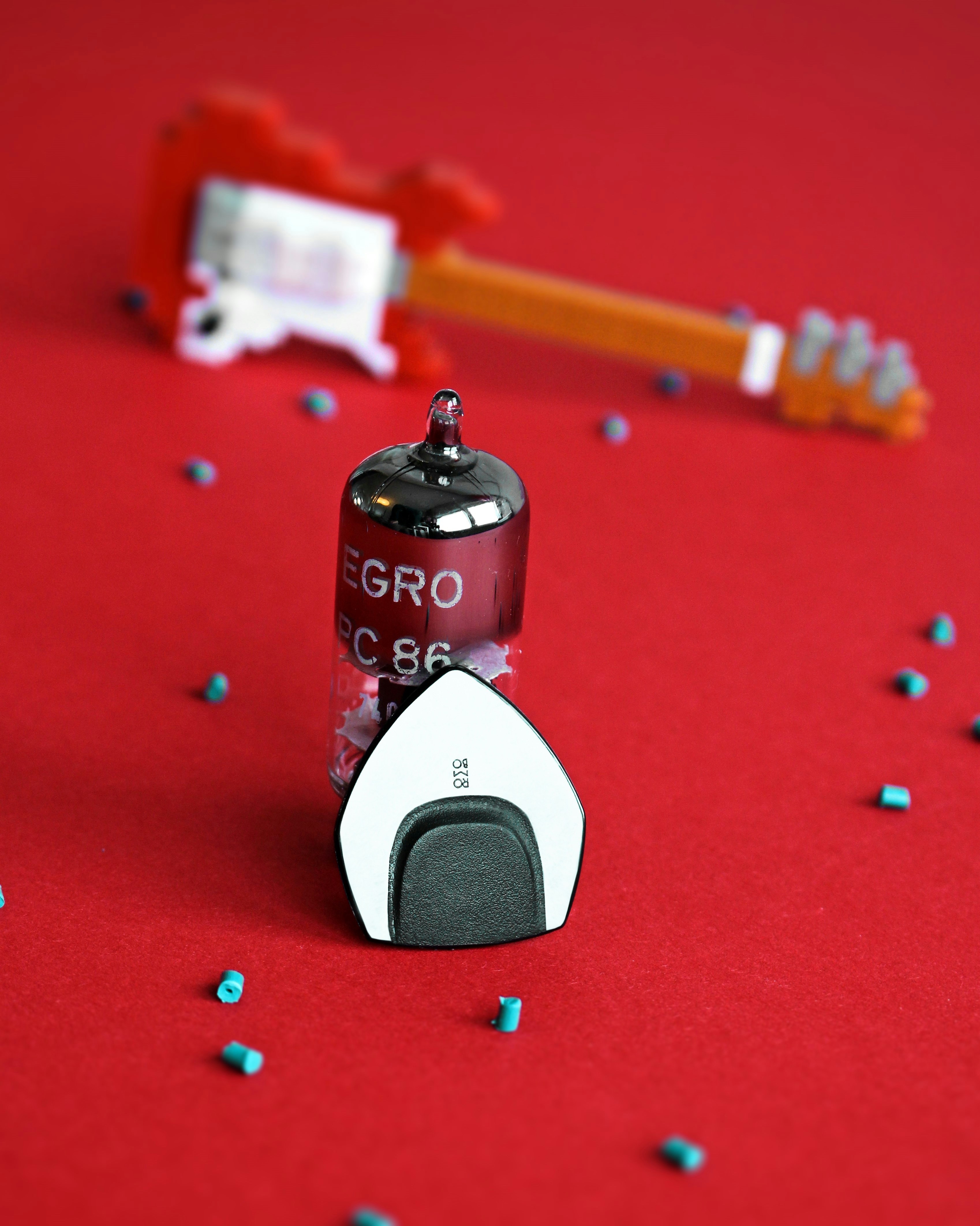 a red table topped with lots of confetti