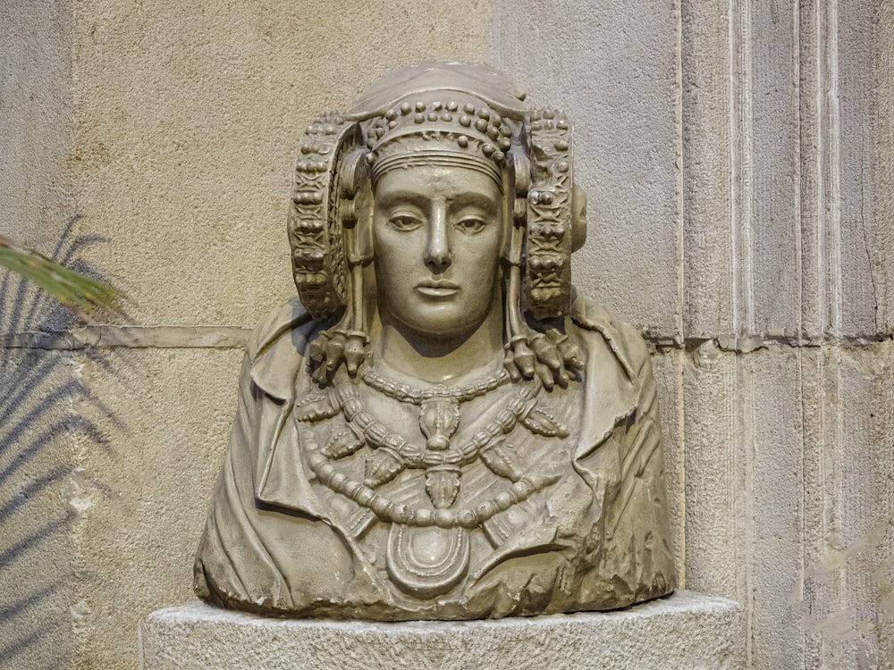 a close up of a statue of a woman