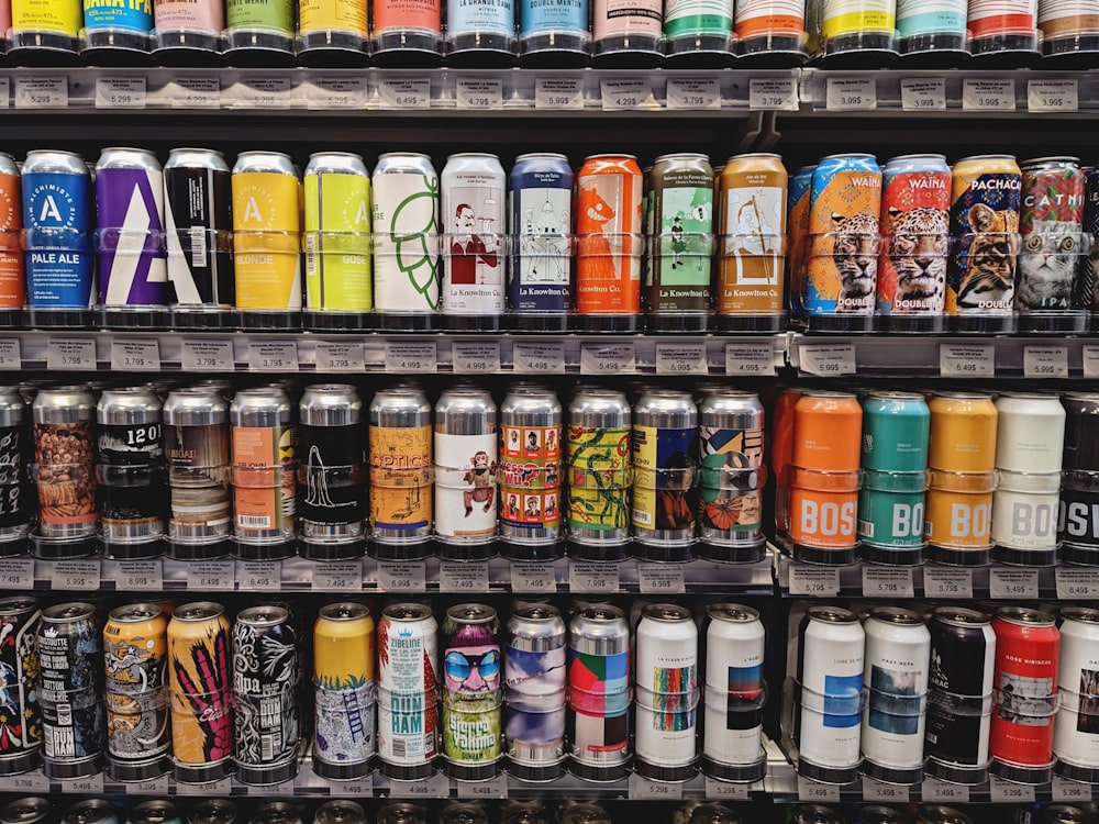 a shelf filled with lots of different types of cans