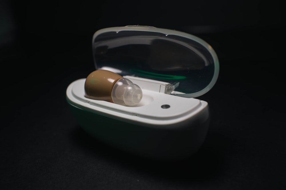 a pair of ear buds in a case