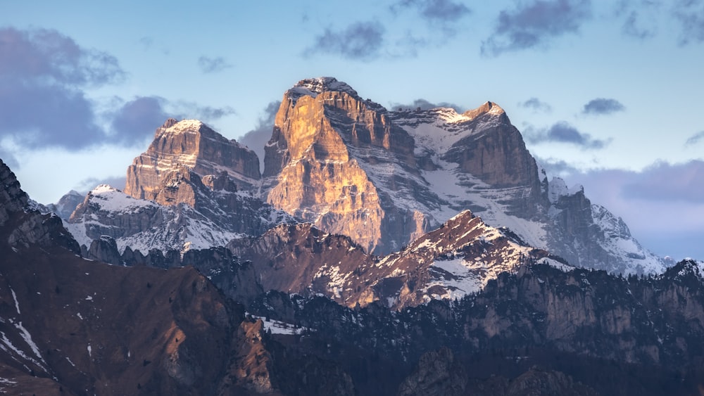 a mountain range with snow on the top of it