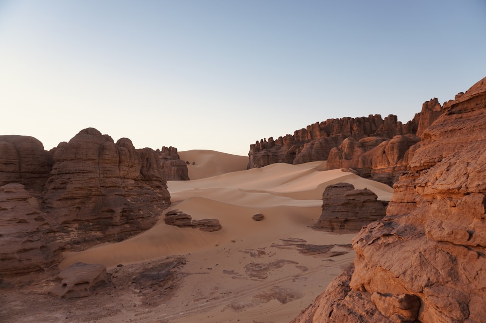 a desert landscape with rocks and sand