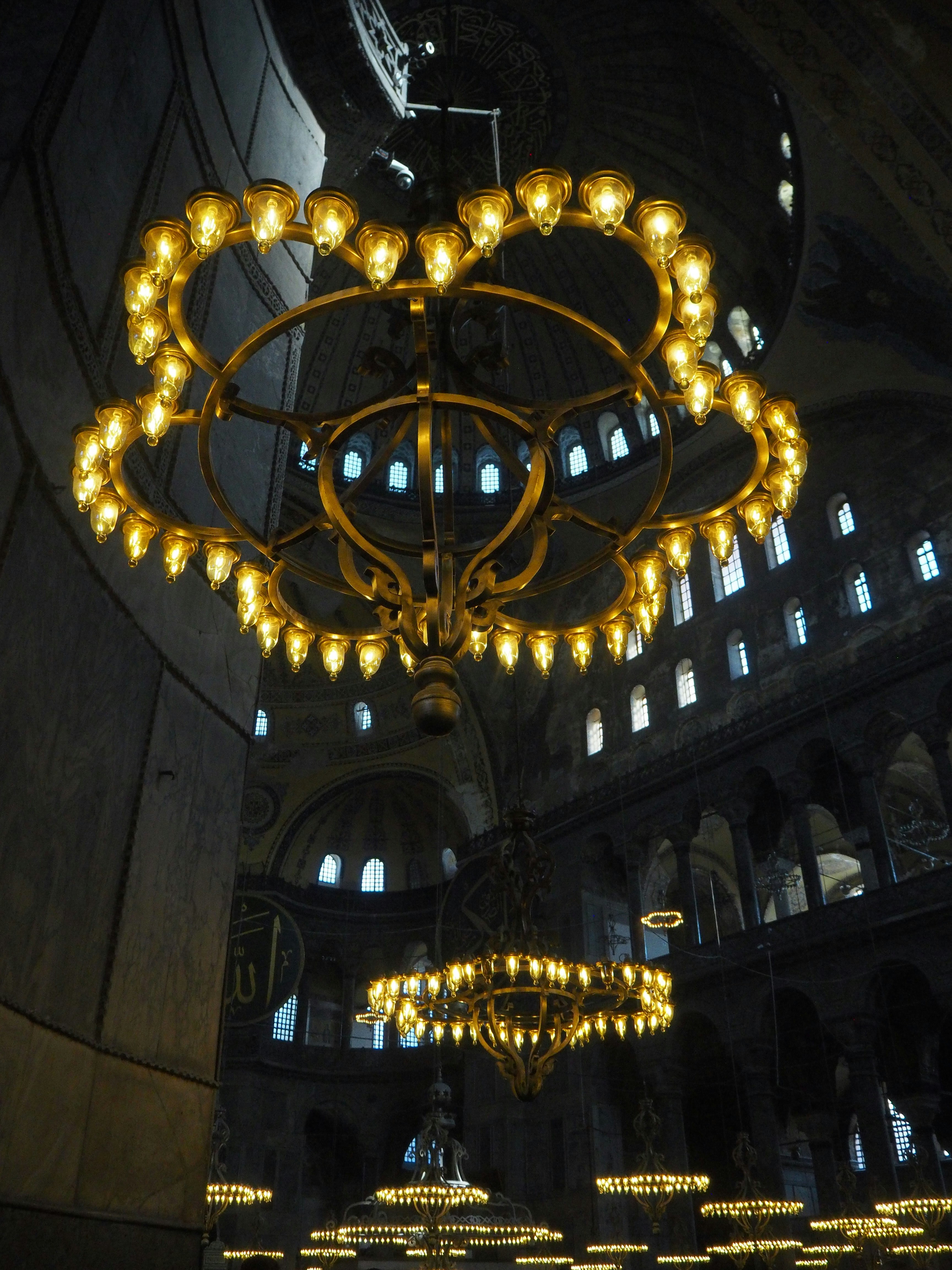 a chandelier hanging from the ceiling of a building