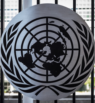 the united nations emblem is on display in front of a window