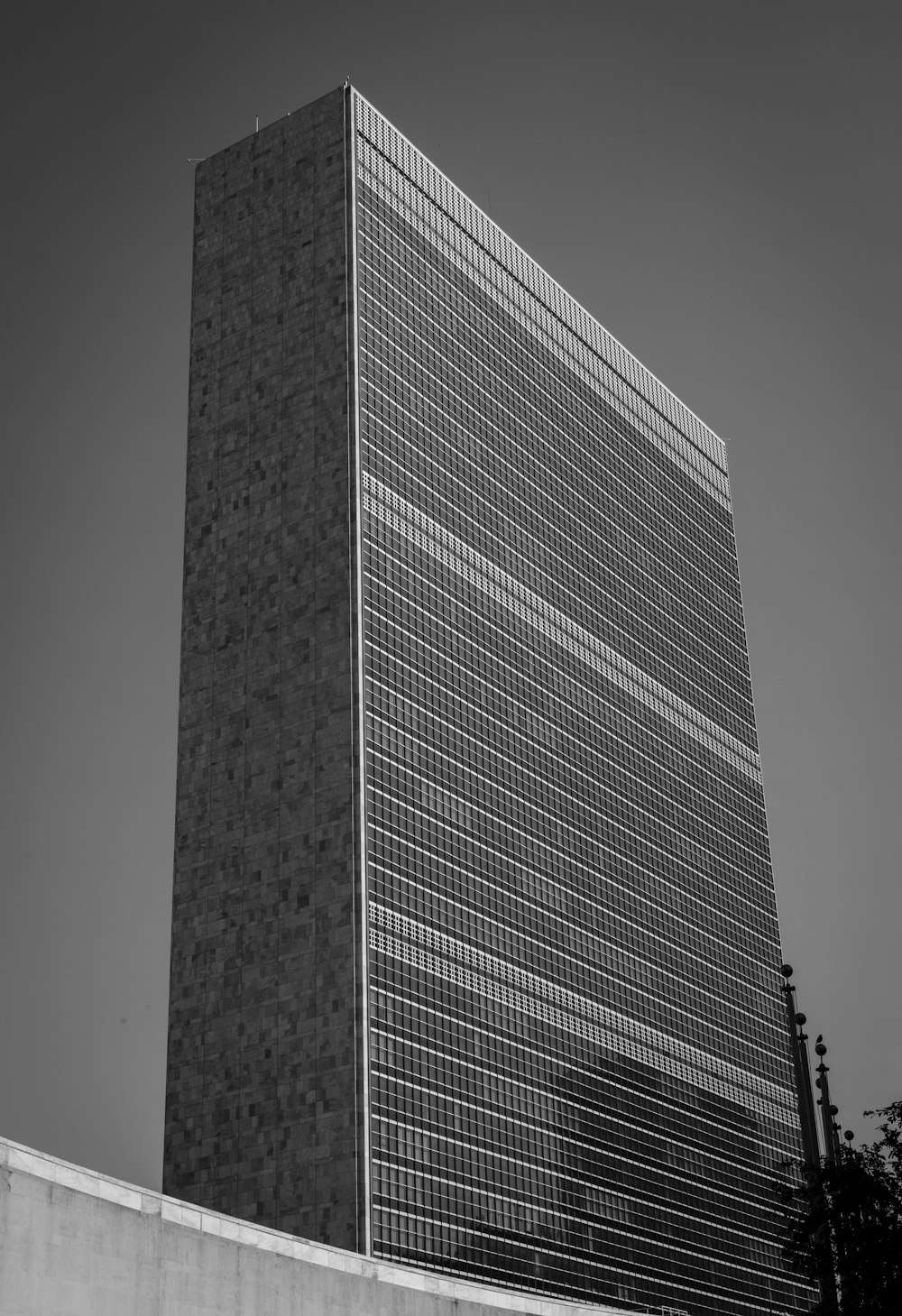 a black and white photo of a tall building