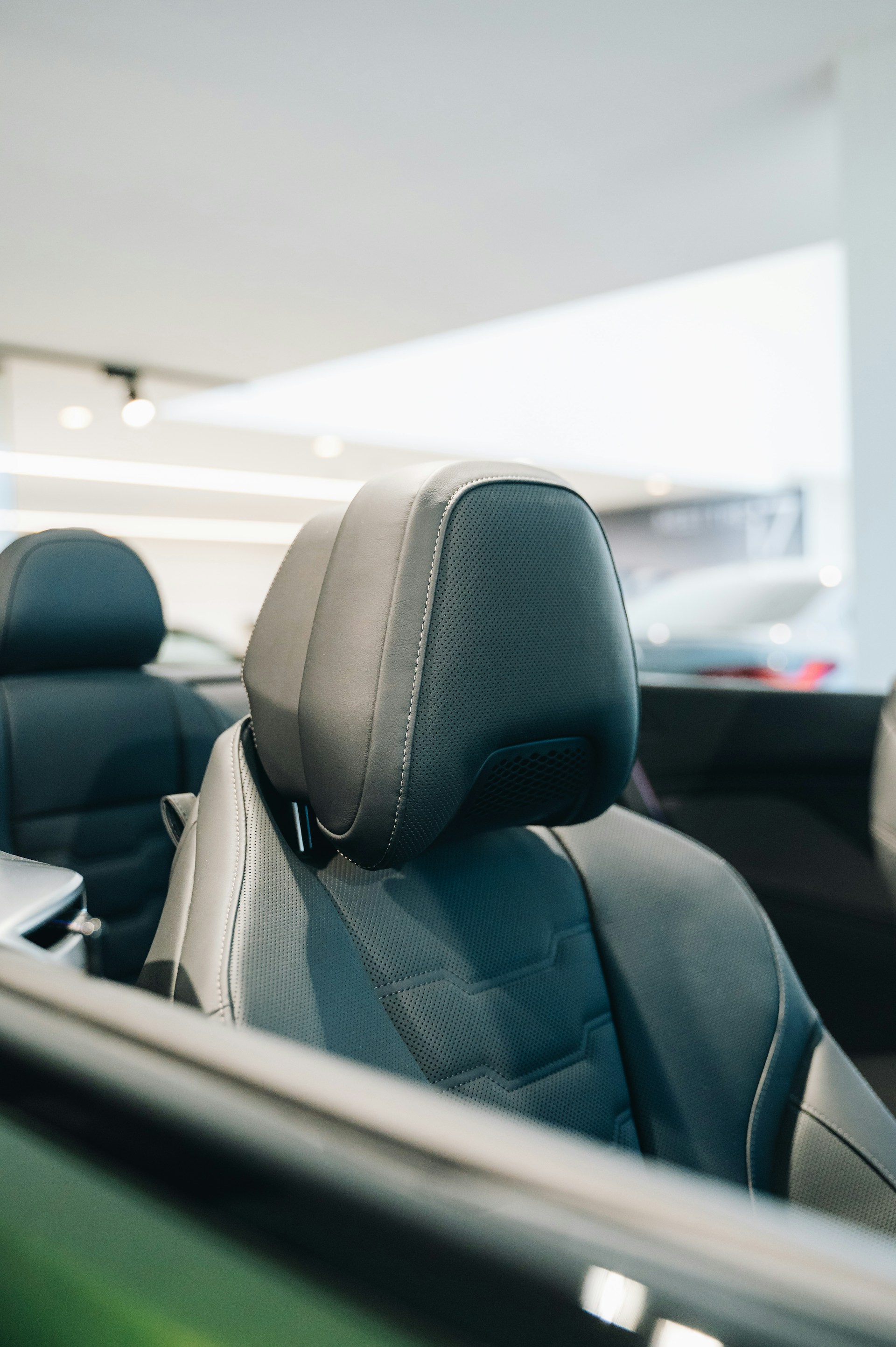 the back seats of a car in a showroom