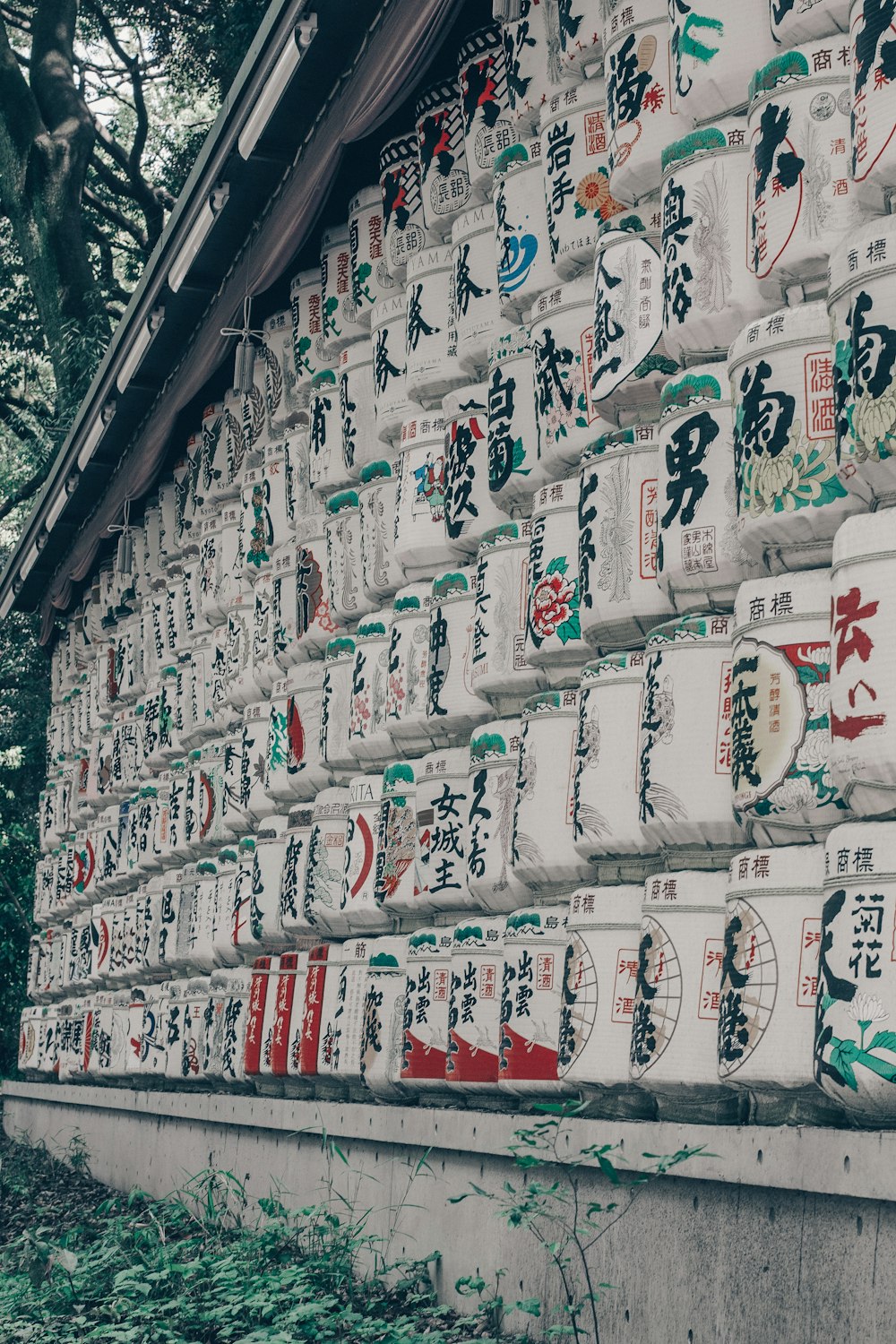 a wall covered in lots of different kinds of signs