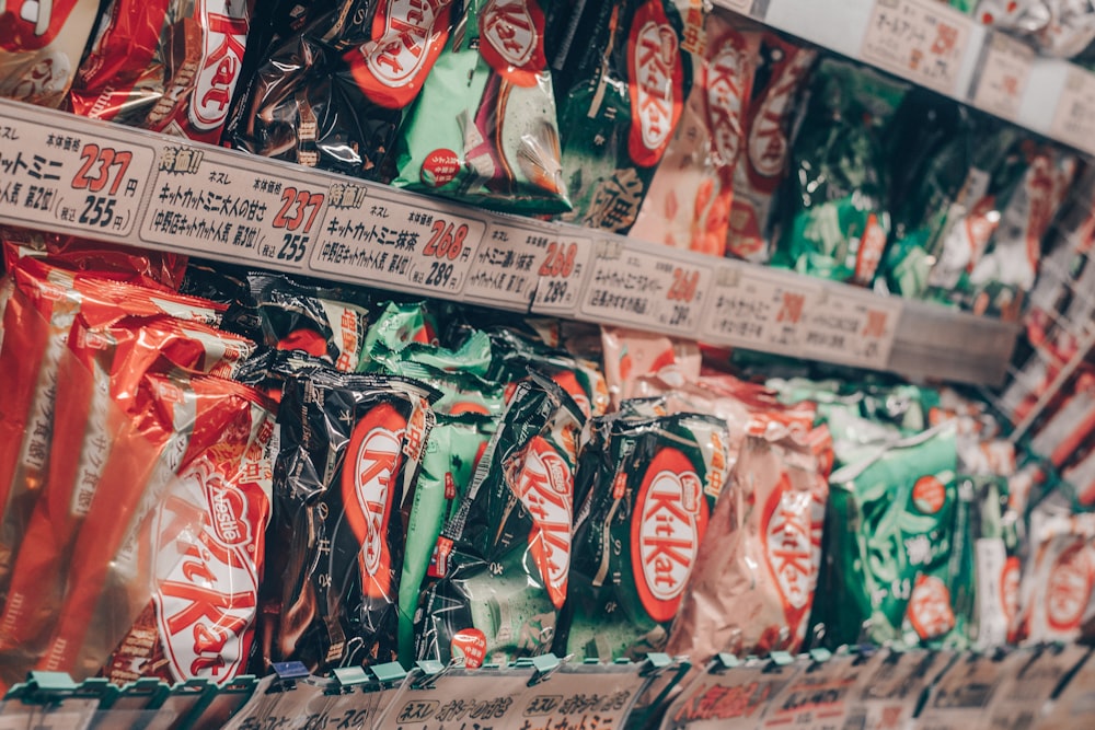 a display in a store filled with lots of bags of candy