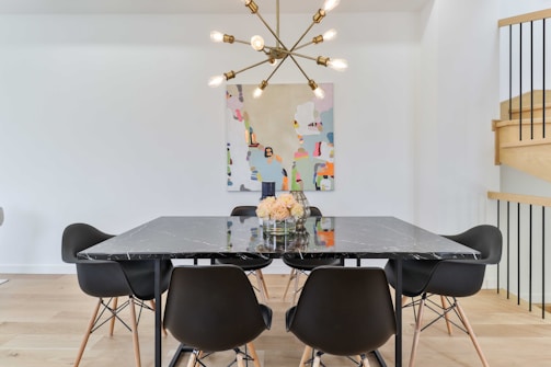 A stylish dining chair set in a modern dining room.