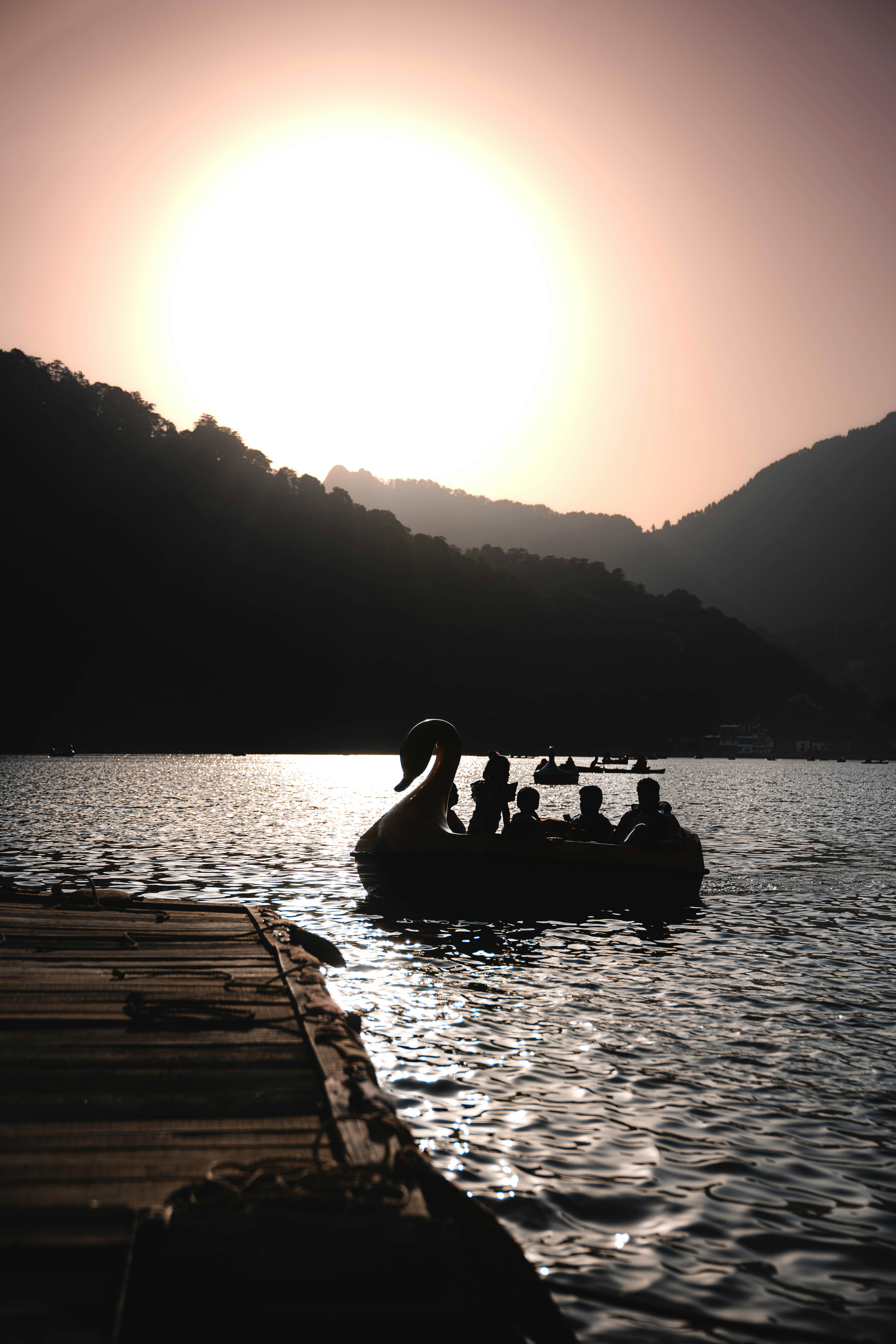 Lake Pichola boat ride with Jag Mandir palace in background at sunset