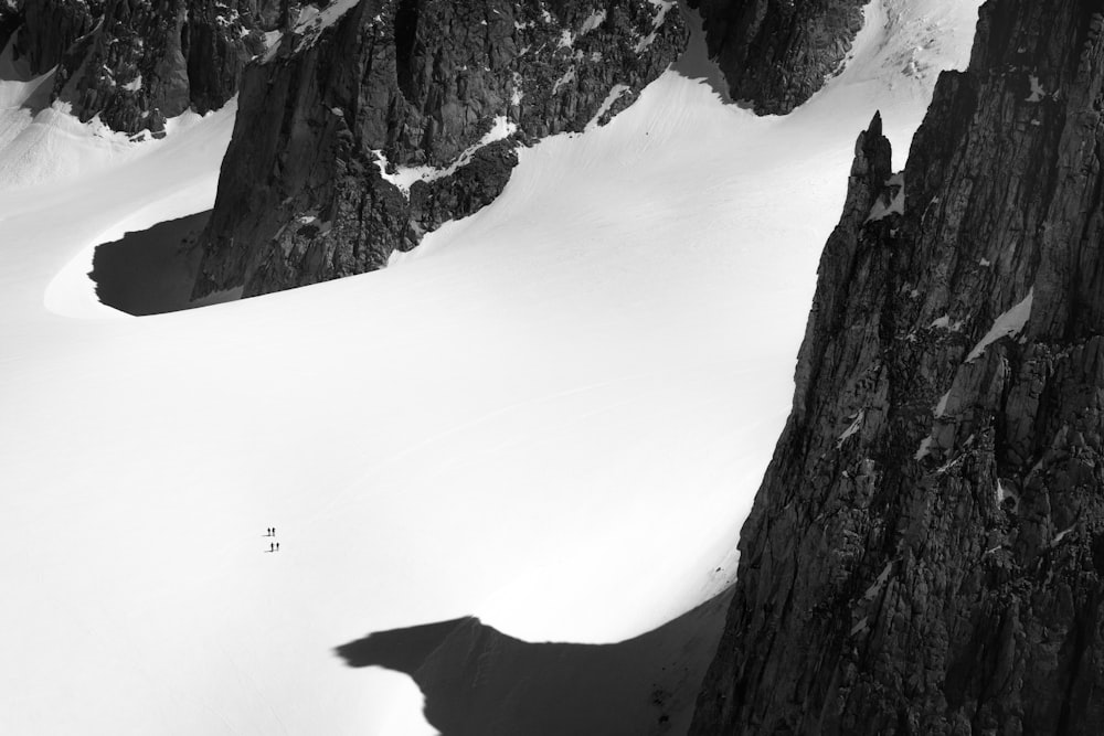 a person skiing down a snow covered mountain