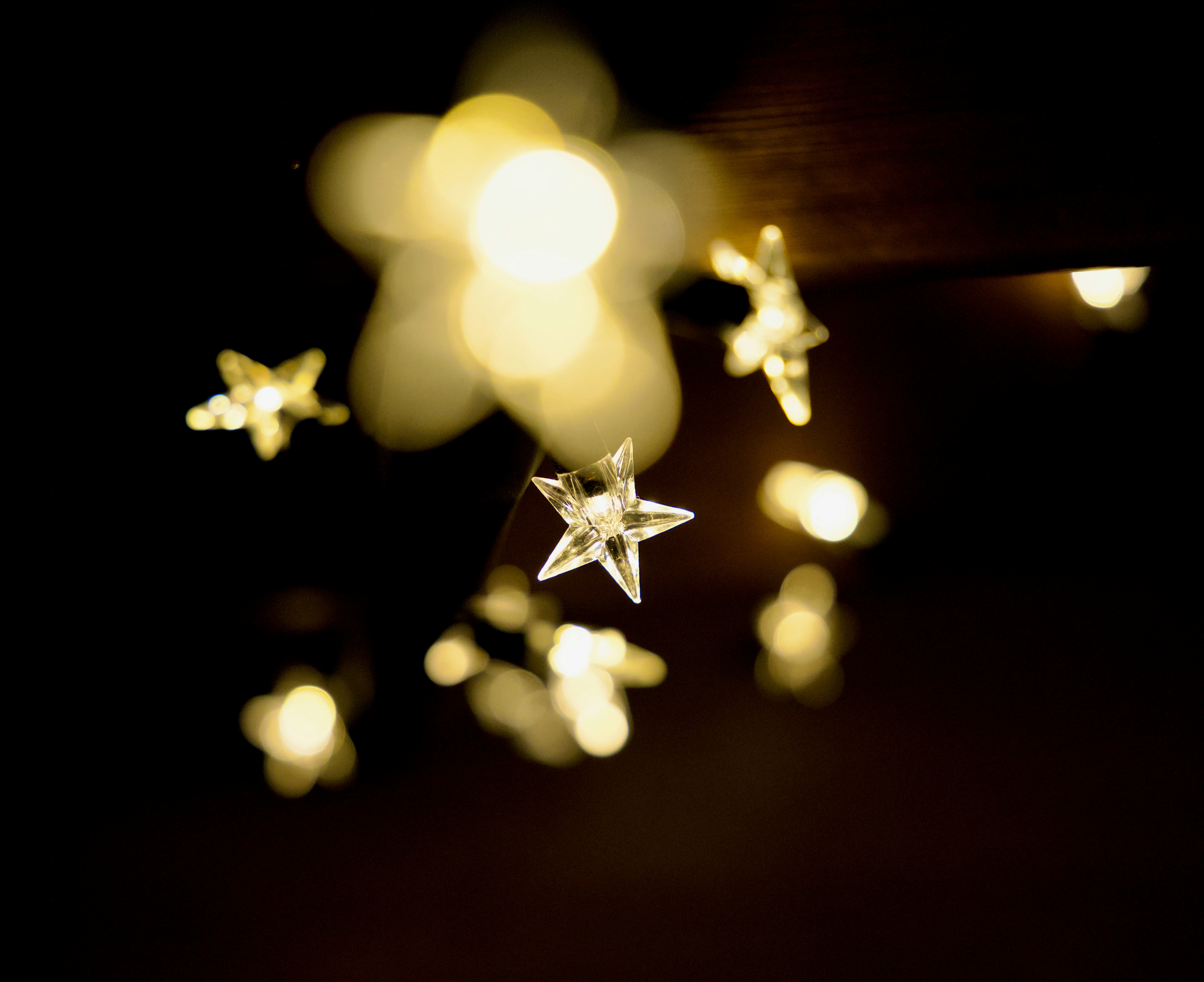 a group of stars hanging from a ceiling