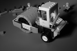 a black and white photo of a construction vehicle