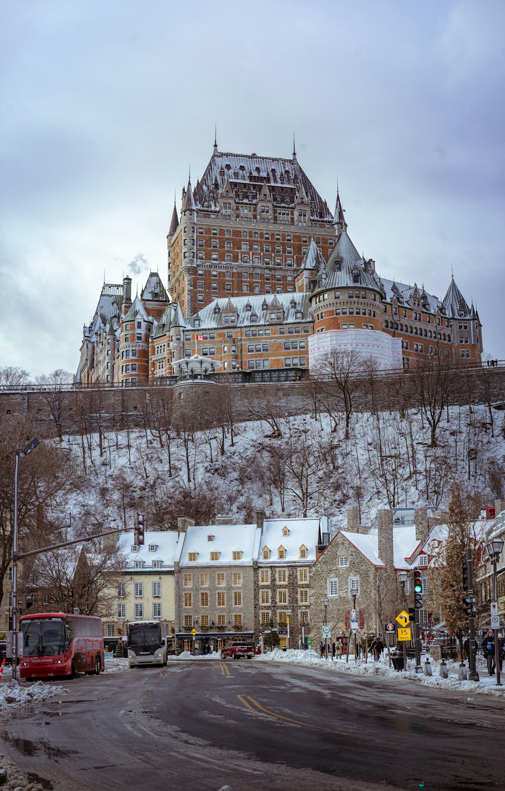 a large castle like building on top of a hill