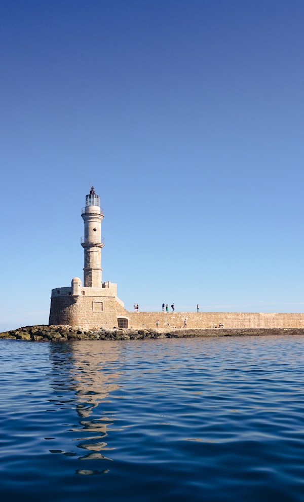 Angkor Wat silhouette at sunrise with reflecting pool