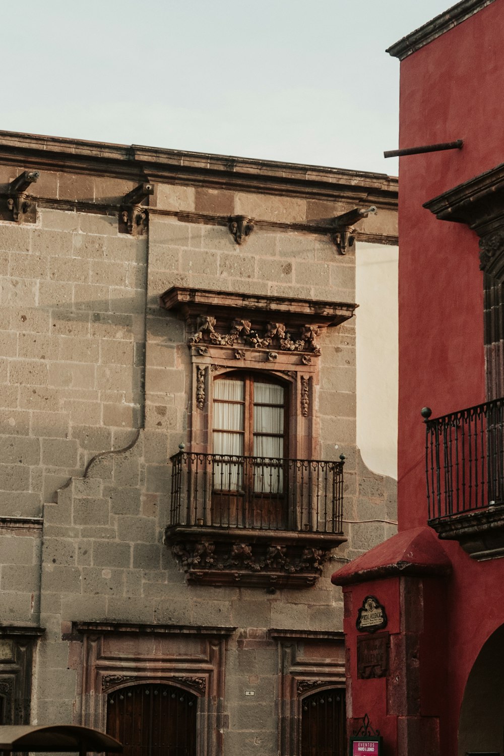 an old building with a balcony and balconies