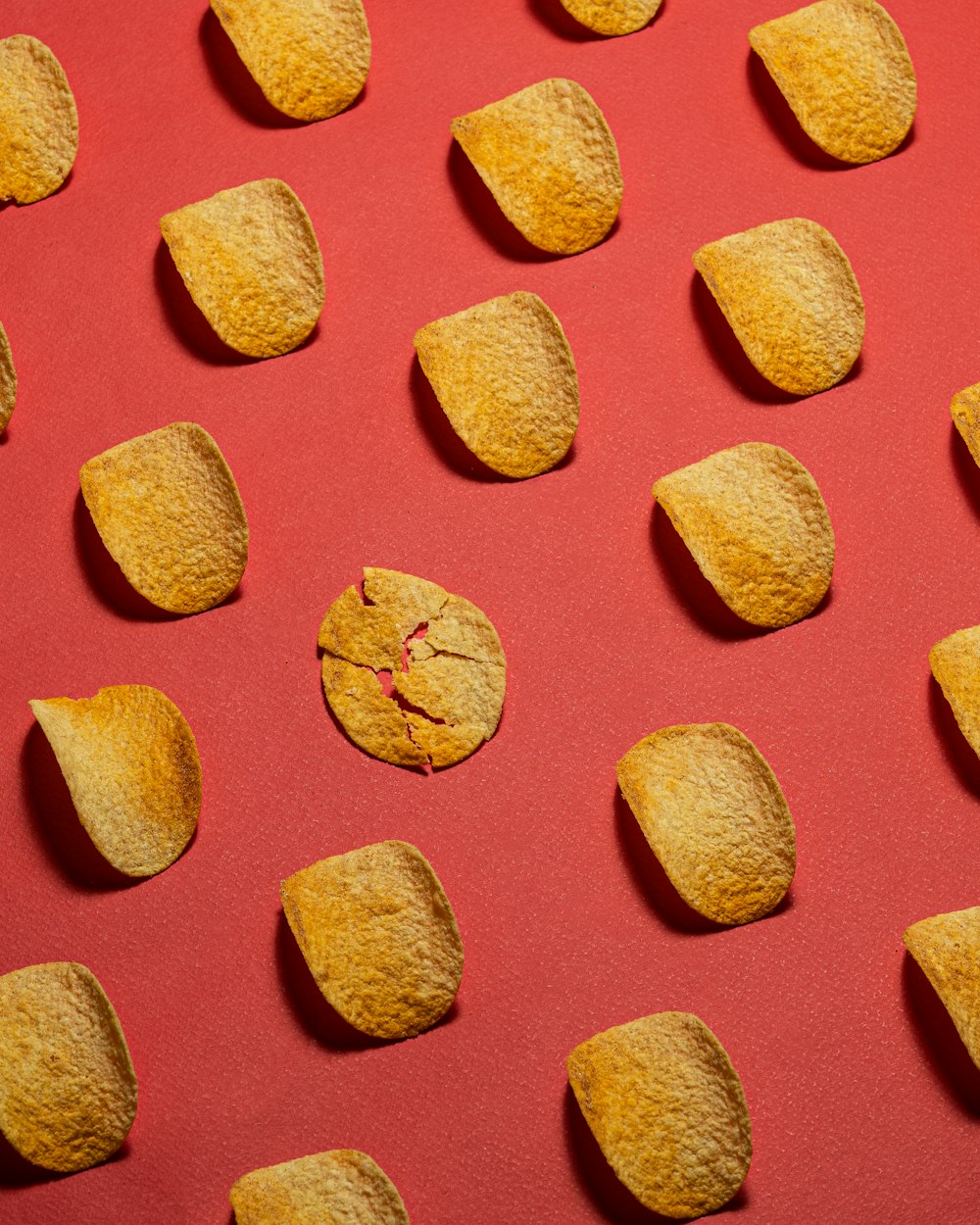 a close up of some food on a red surface