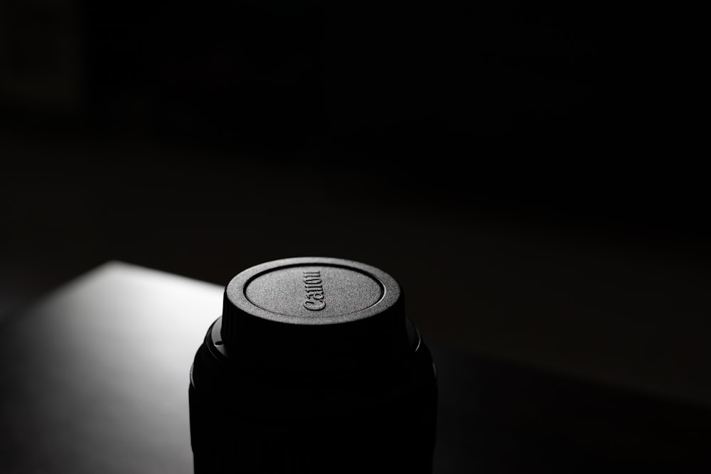 a can of soda sitting on top of a table