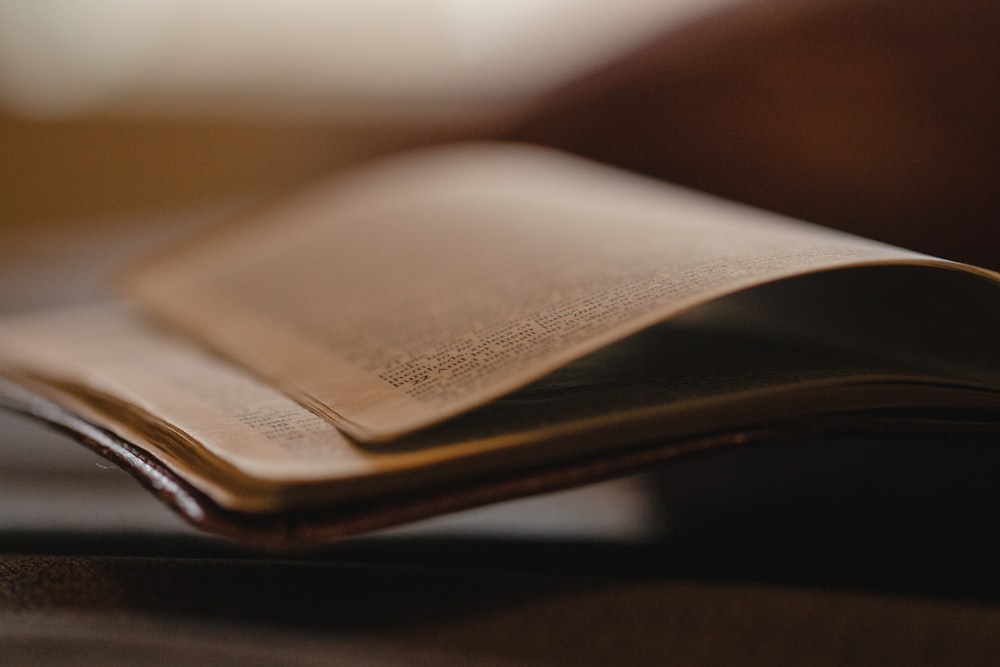 an open book sitting on top of a table