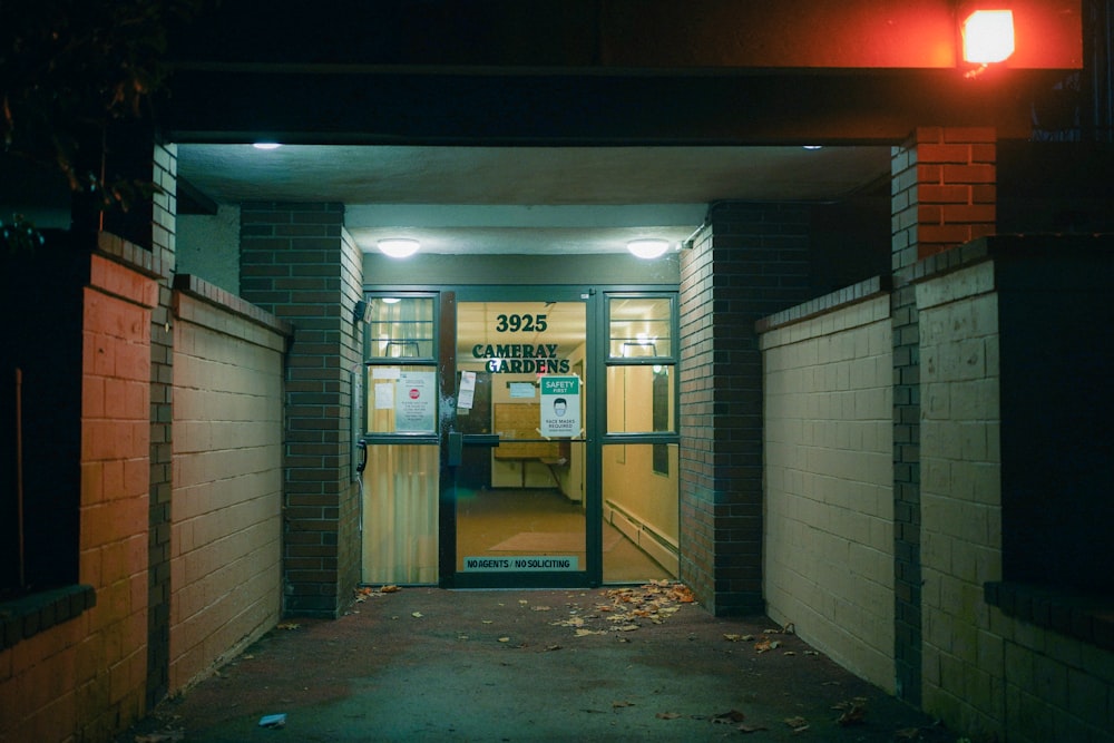 a doorway leading into a building at night