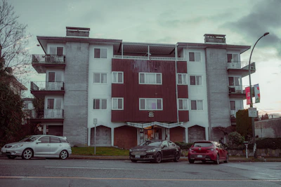 A value-add property showing a mid-century apartment building in need of renovation.