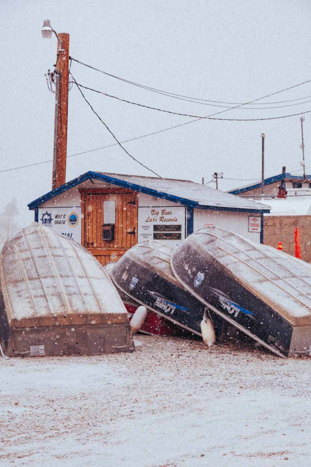 a couple of boats sitting on top of a flooded street