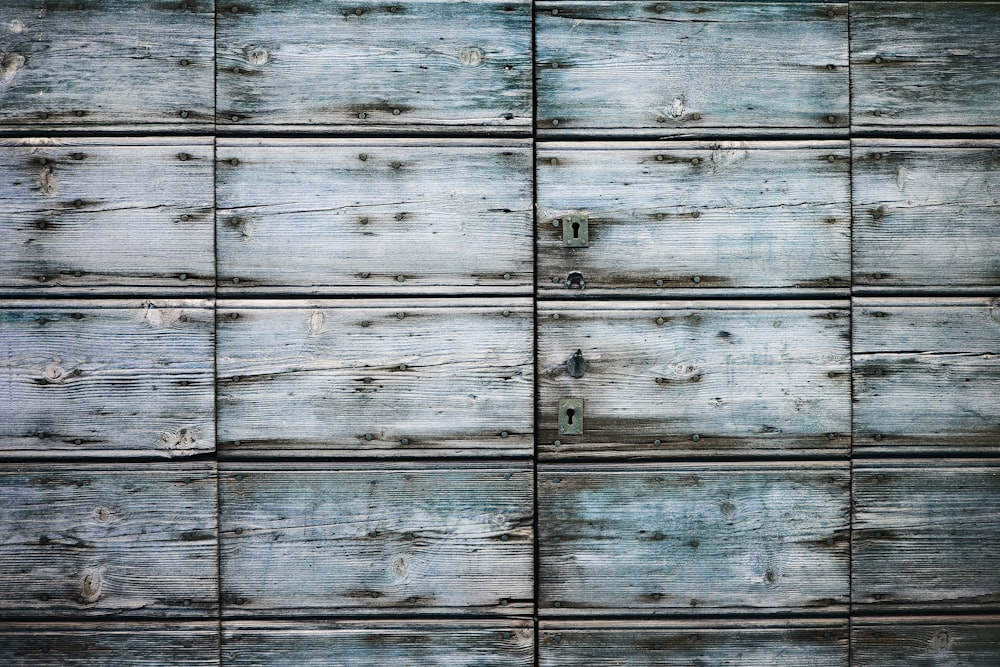 a close up of a wall made of wooden planks