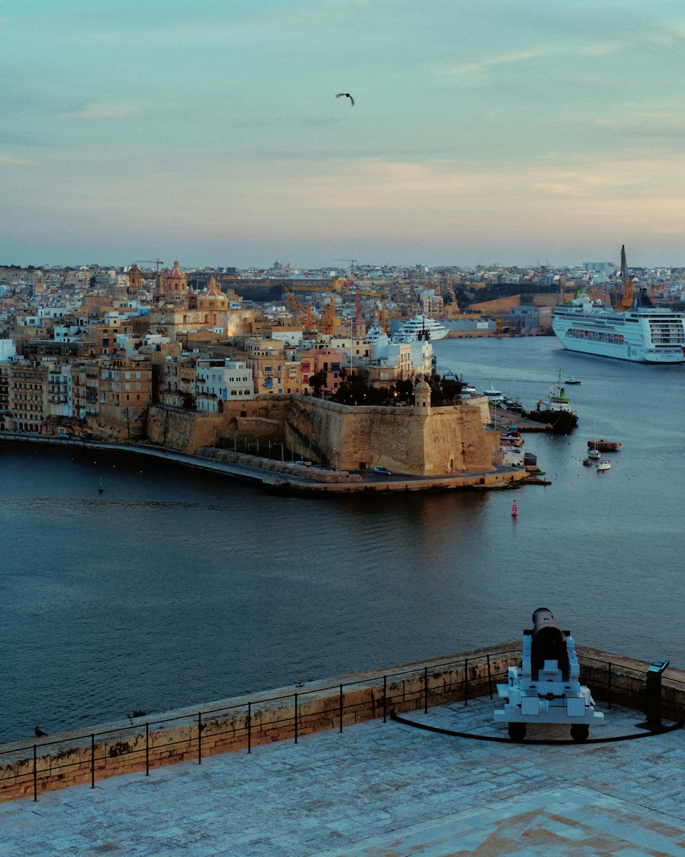 a large body of water next to a city