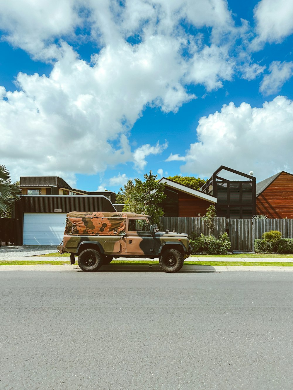 a military truck parked on the side of the road