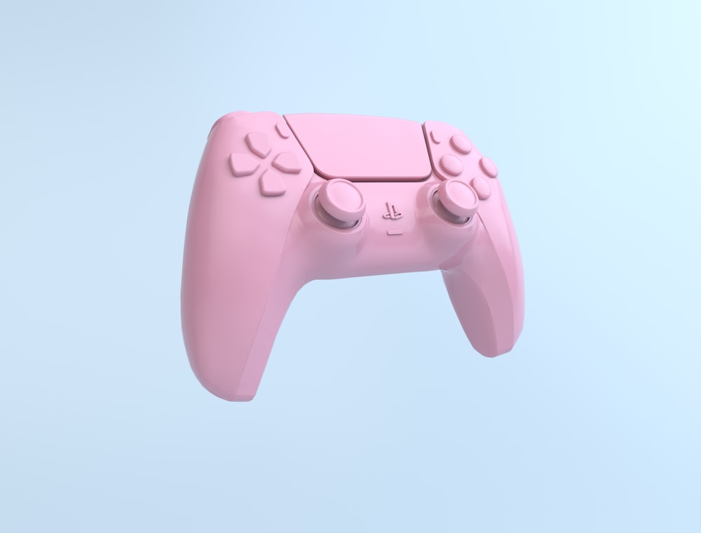 a pink video game controller flying through the air