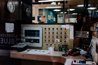 The radio station control room with modern equipment and colorful guatemalan textiles.