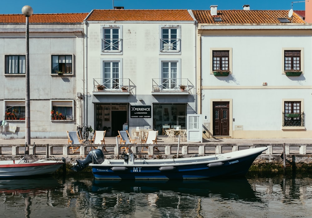 a couple of boats that are sitting in the water