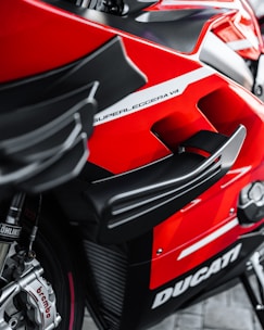 Close-up of a sleek, black motorcycle stand with the vorx™ logo visible