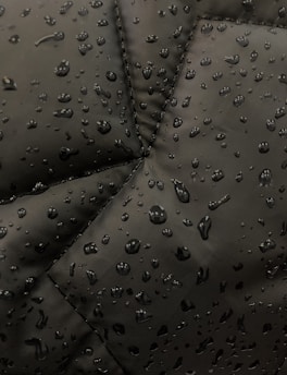 Close-up of rugged, water-resistant fabric texture used in bike covers.