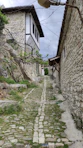 a cobblestone street in a small village