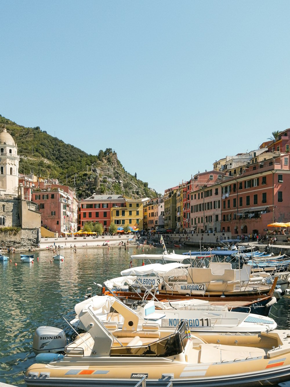 a bunch of boats that are sitting in the water