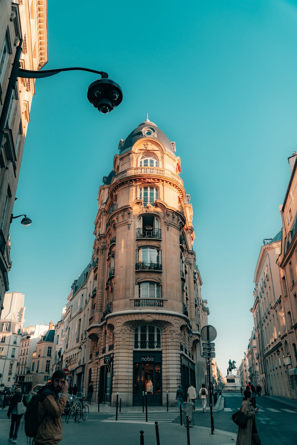 a tall building with a dome on top of it