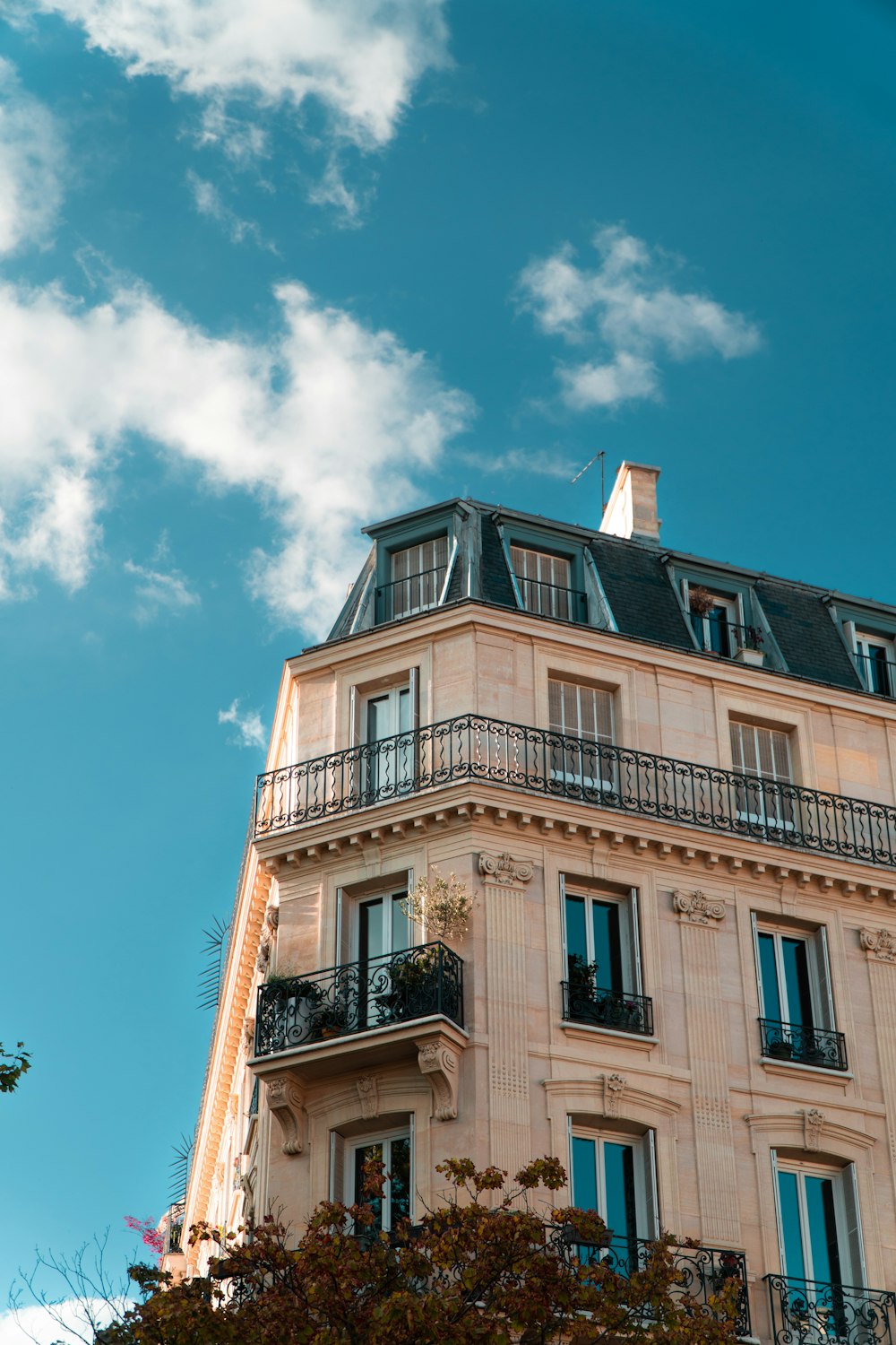 a building with balconies and balconies on top