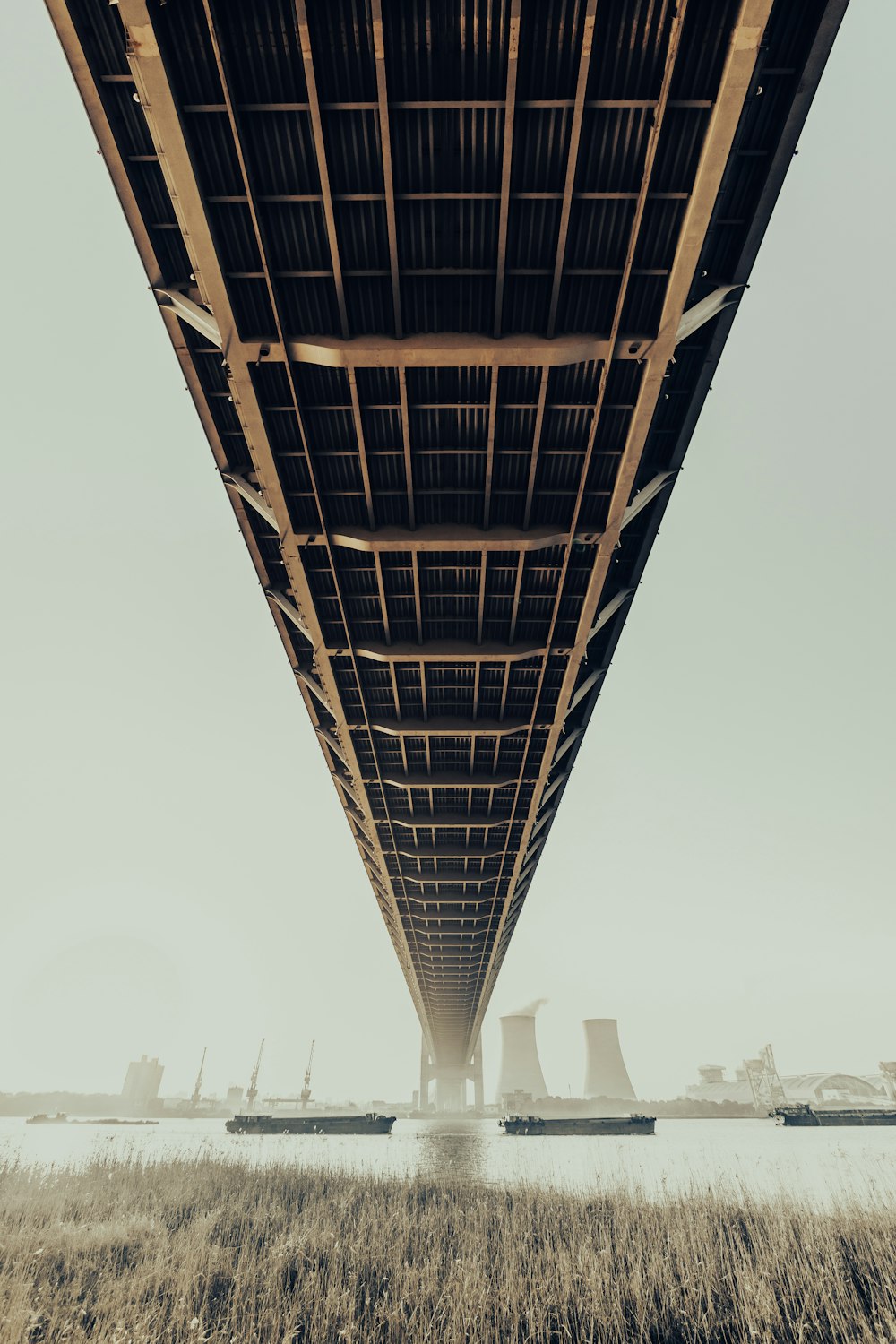 a view of the underside of a bridge