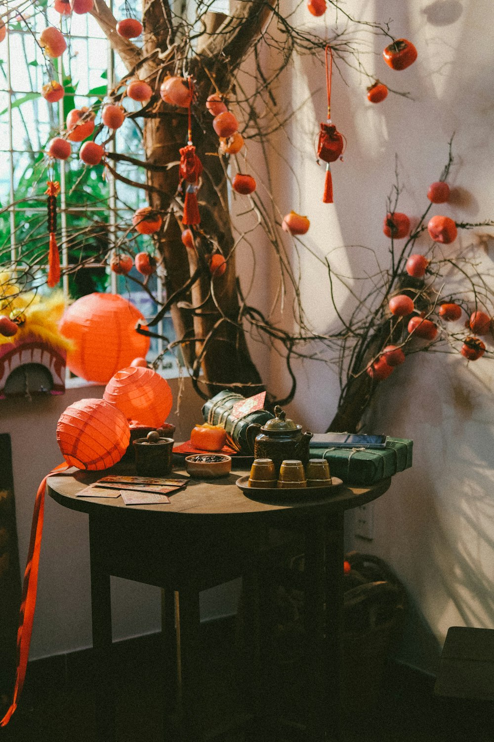 a table topped with lots of orange decorations