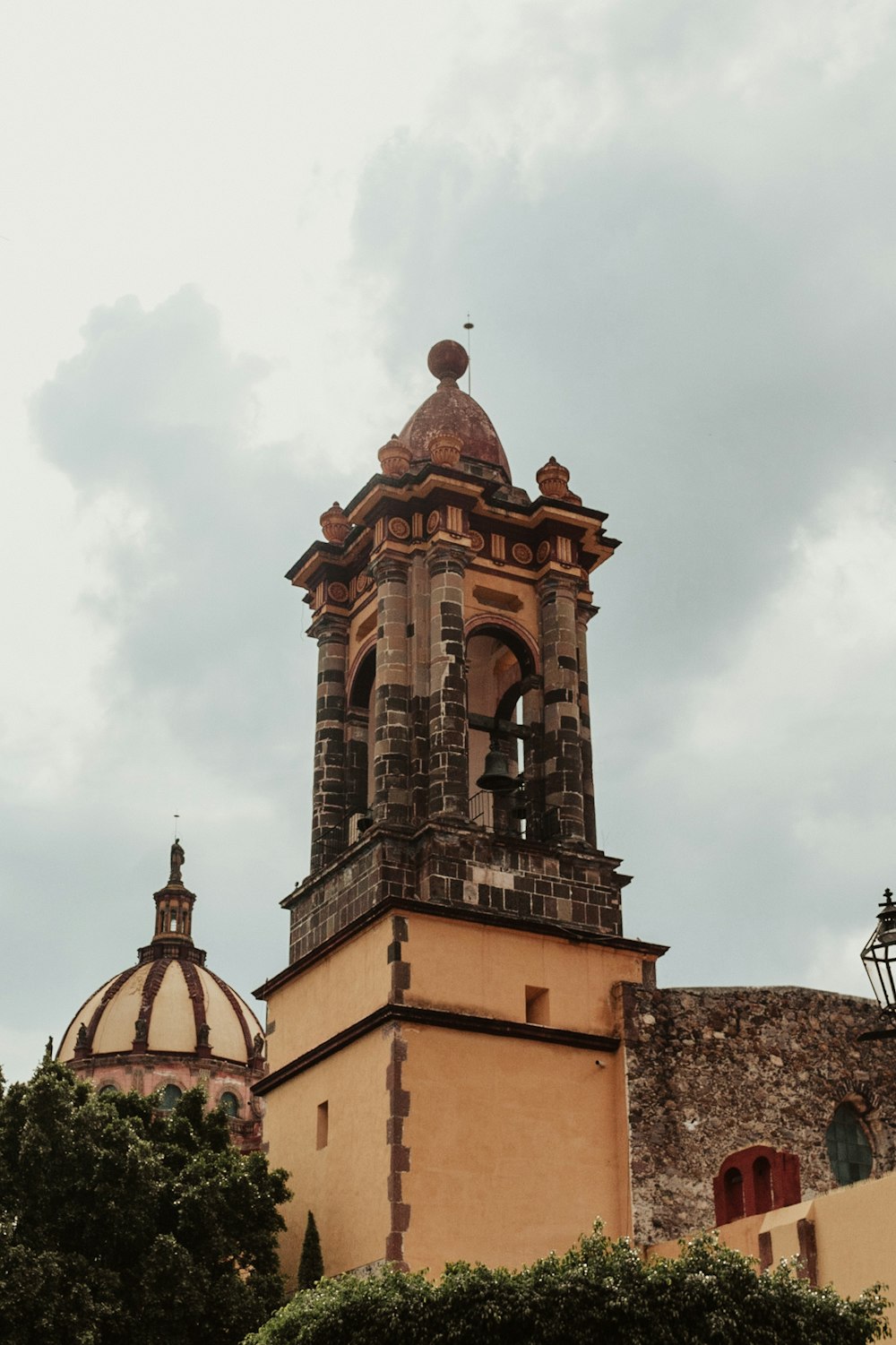 a tall tower with a clock on top of it