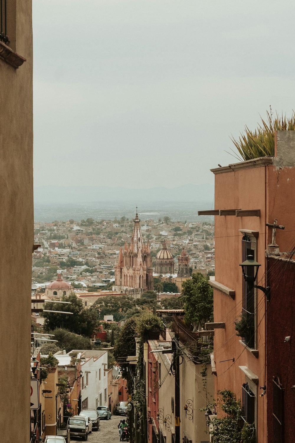 a view of a city from a hill